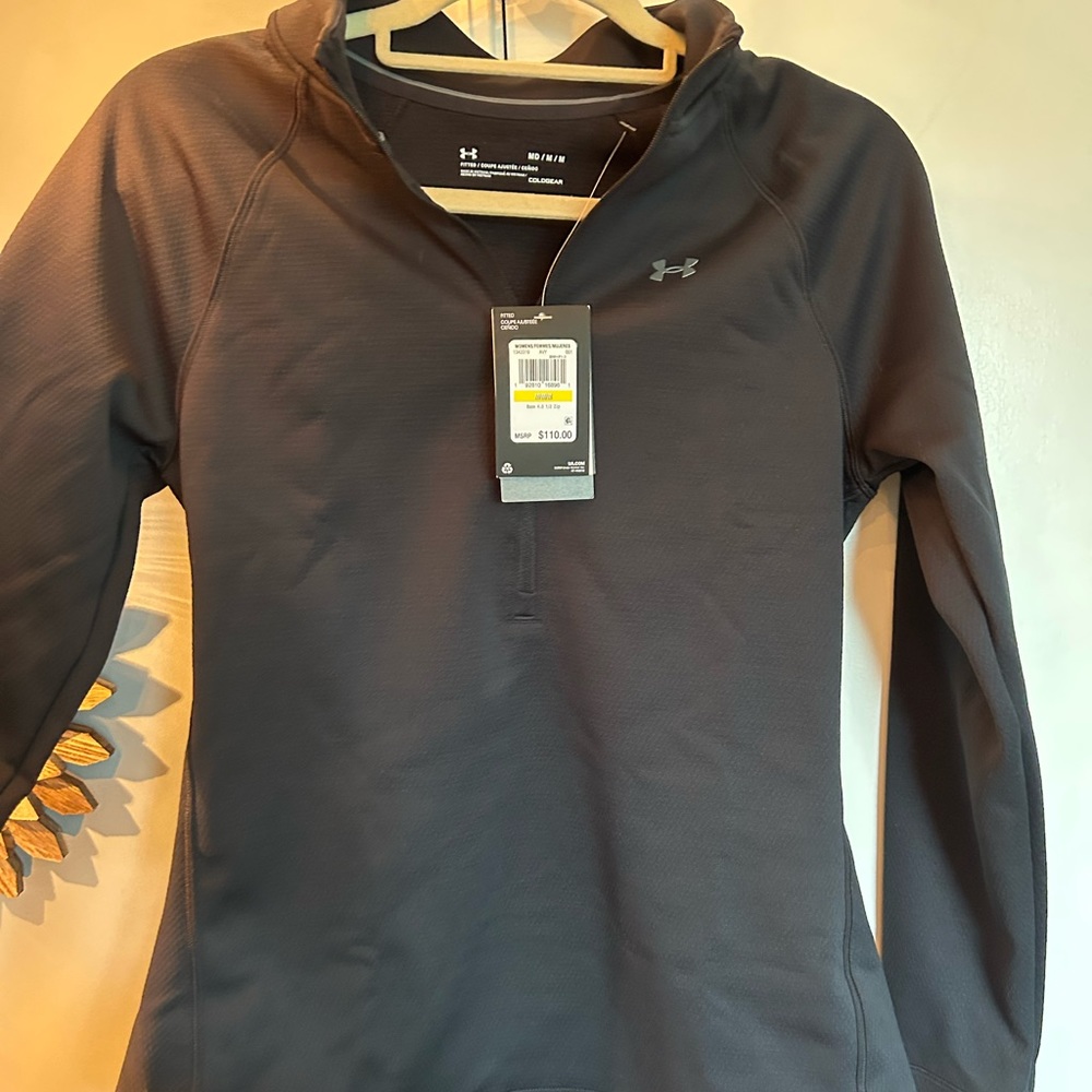 Women’s black UA quarter zip